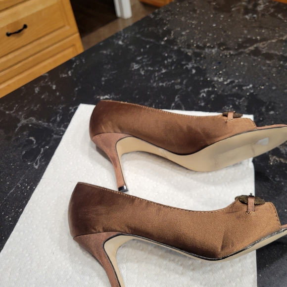 Size 9 satin heels metallic bronze color. - Picture 3 of 3